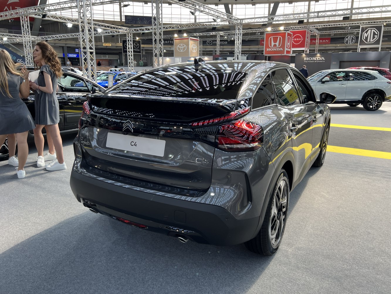 Rear view of a hatchback with modern LED tail lights