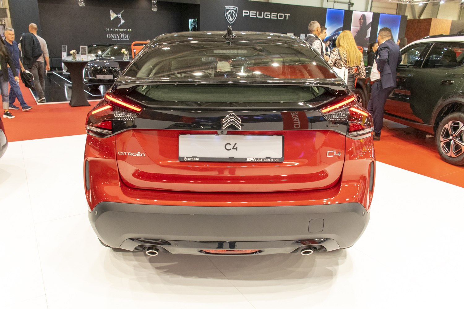 Rear hatchback view with LED taillights and dual exhaust pipes
