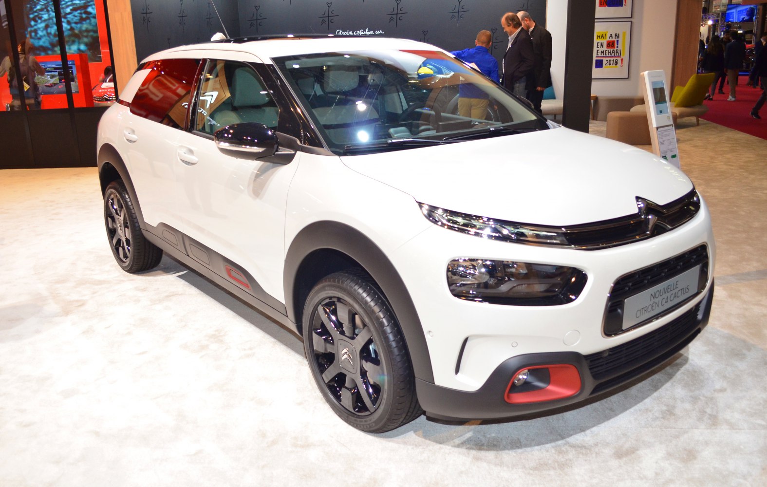 Modern SUV front-end design with black accents and sporty rims