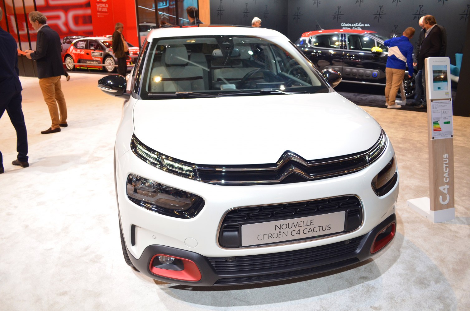 Front view with modern headlights and black grille
