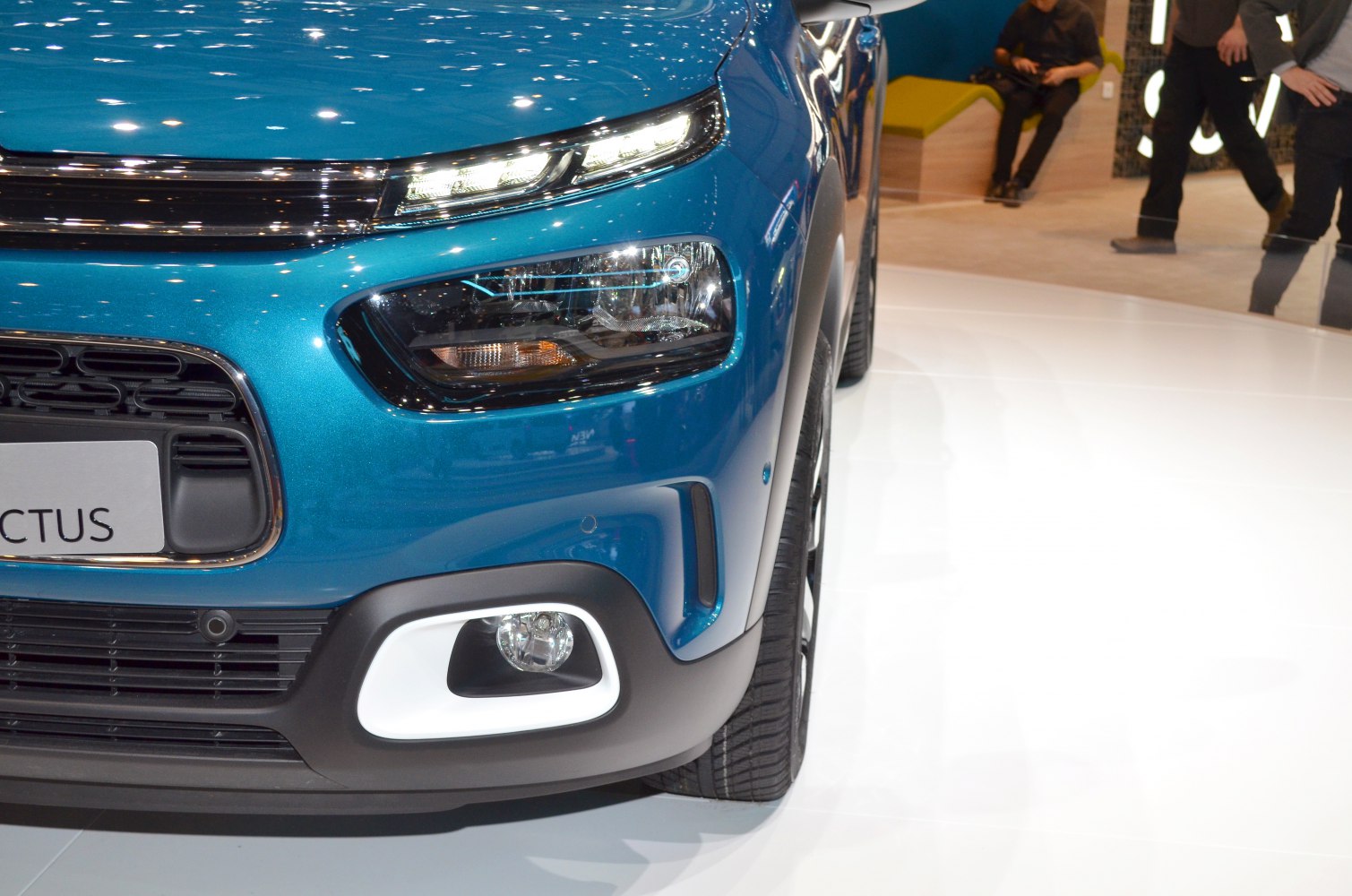 Close-up of front headlights and fog light cluster
