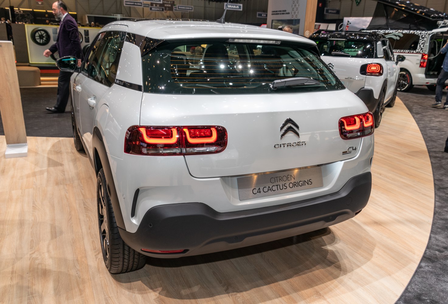 Rear view with distinctive taillights and hatchback design