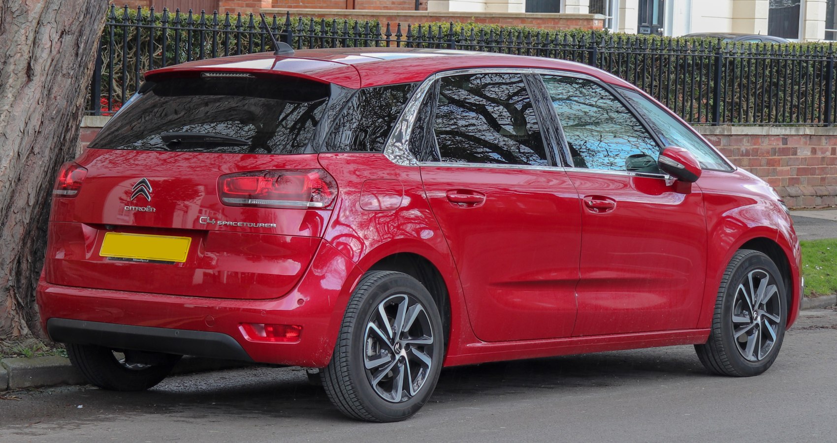 Rear view with taillights and alloy wheels