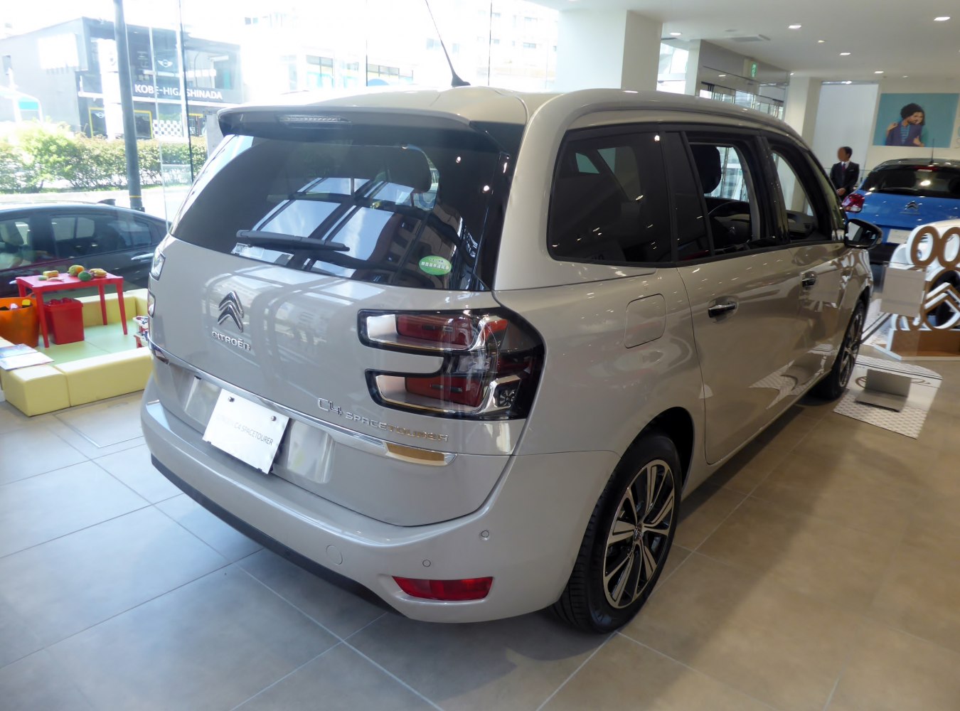 Rear and side view with distinct taillights and large windows