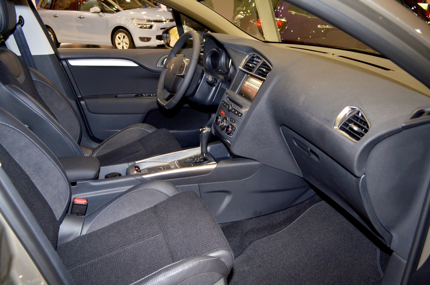 Automatic transmission gear shift and modern car interior with front seats
