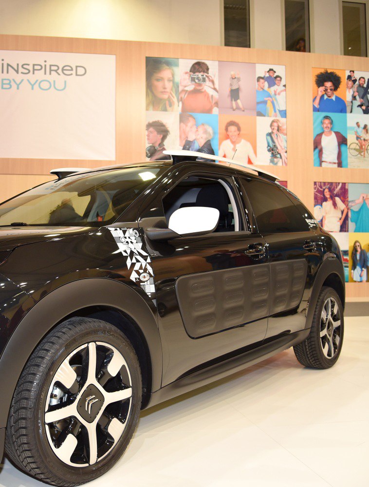 Distinctive side Airbump panels and unique alloy wheel design.