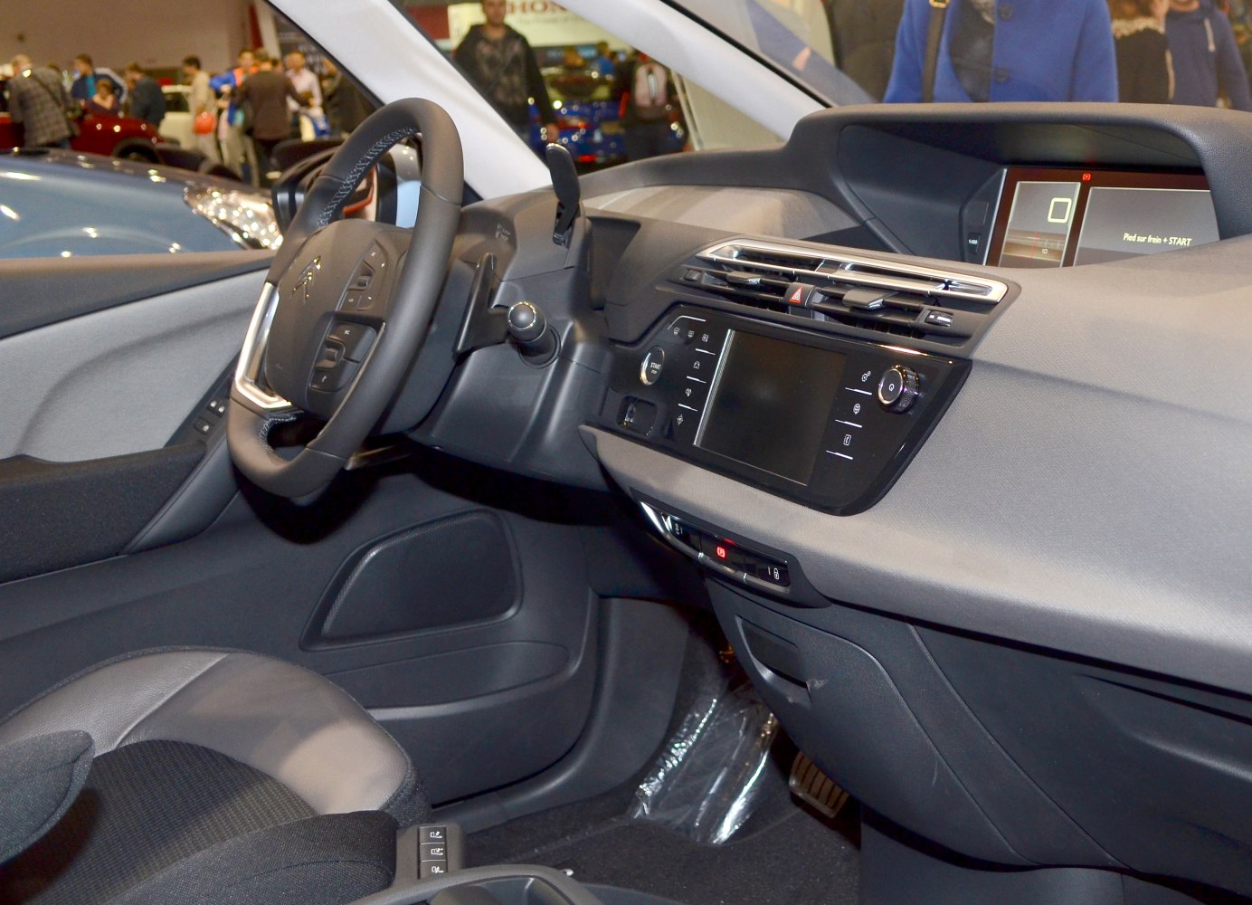 Modern dashboard with touchscreen and compact steering wheel