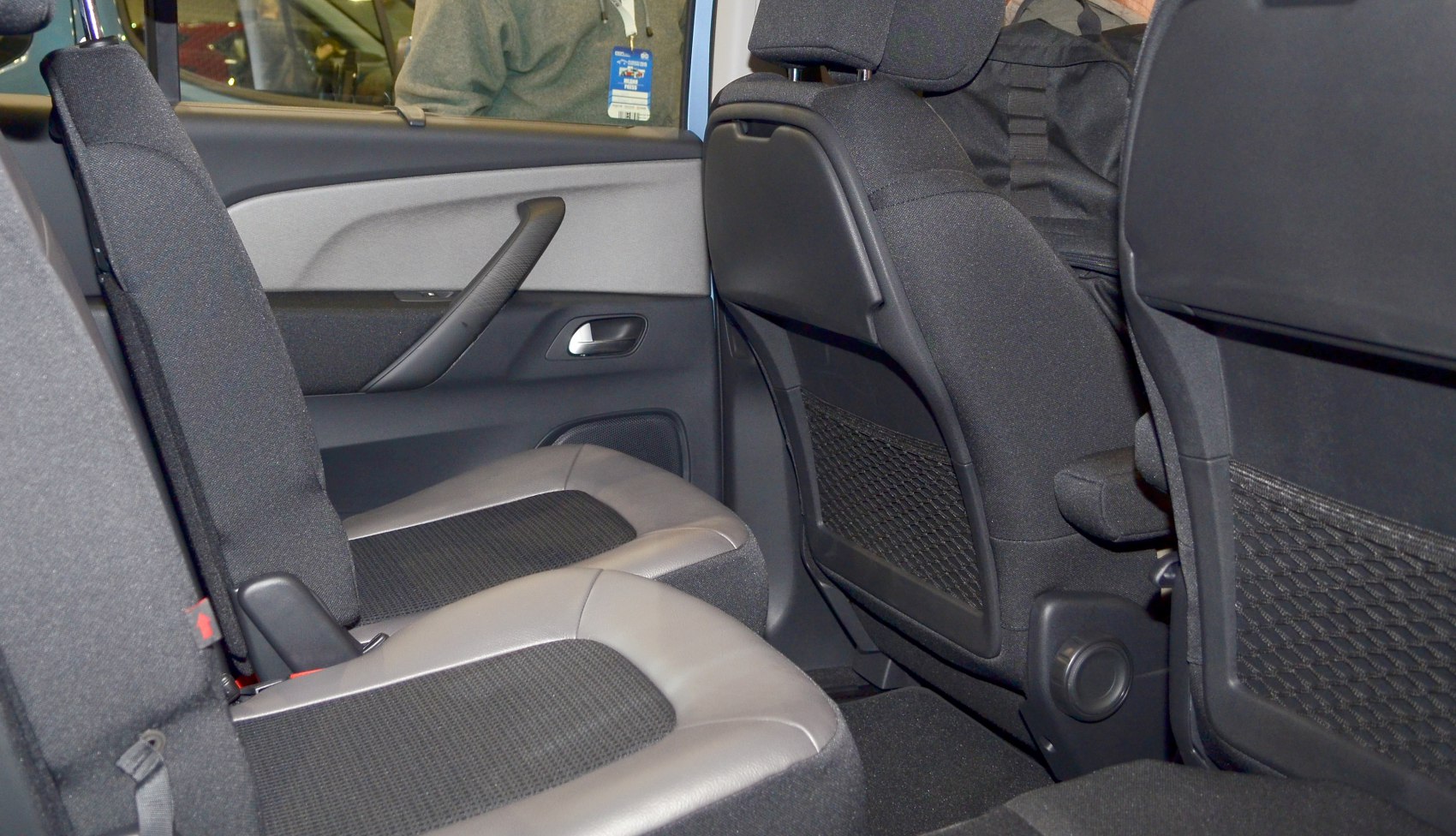 Rear seating and interior details with fabric and leather upholstery