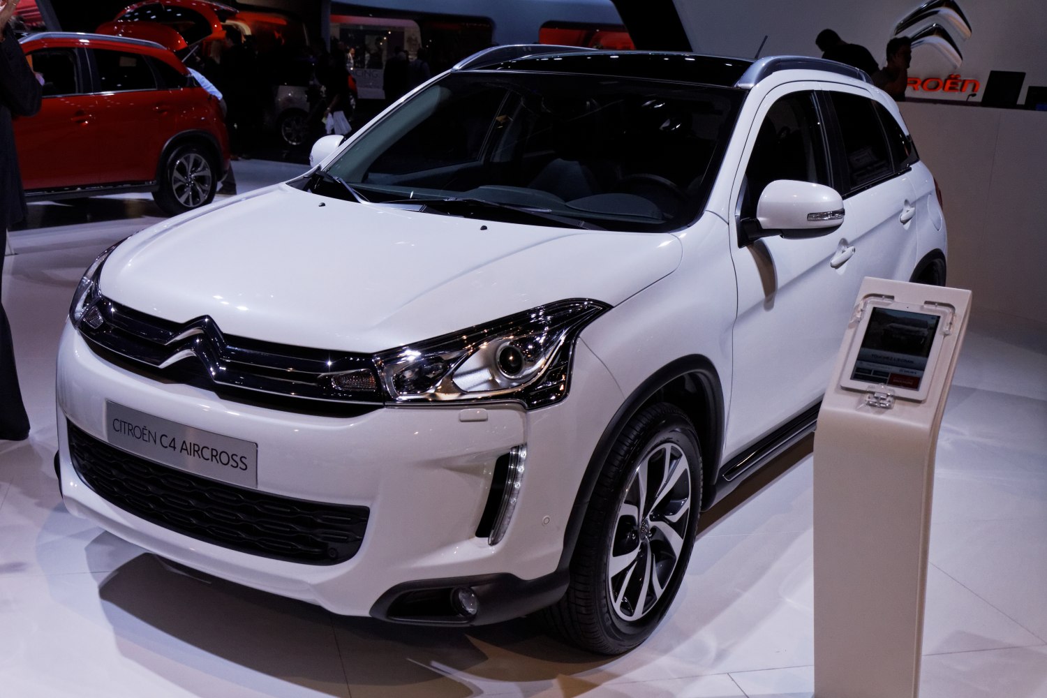 Front view with distinctive headlights and grille.