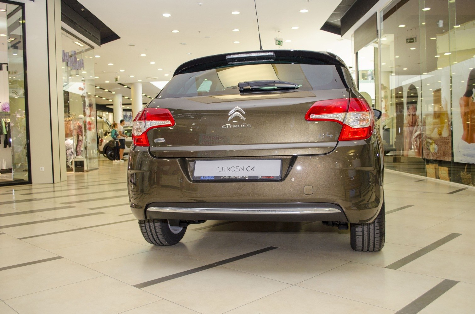 Rear view of a hatchback with distinct taillights and rear windshield wiper