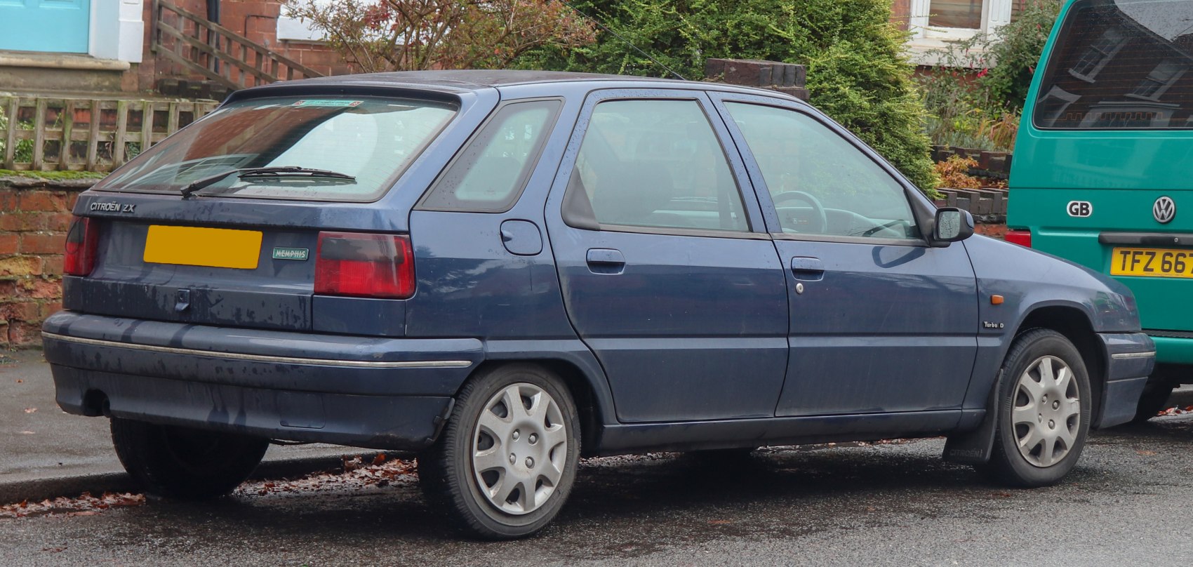Compact five-door hatchback with distinct rear lights and Turbo D badge