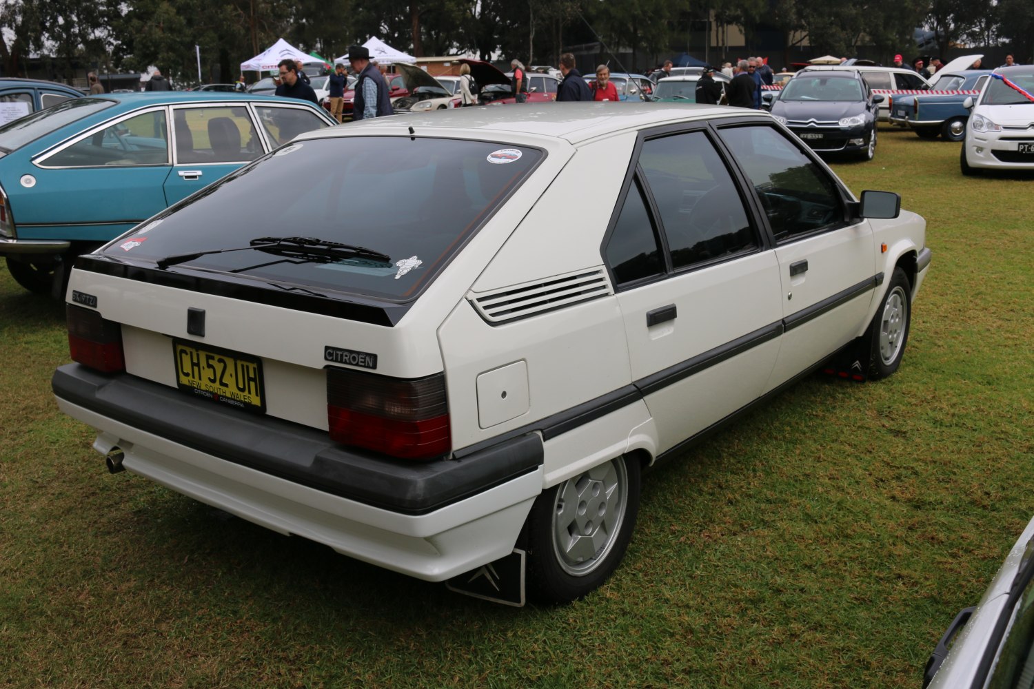 Rear view of angular hatchback with geometric styling and iconic rear window.