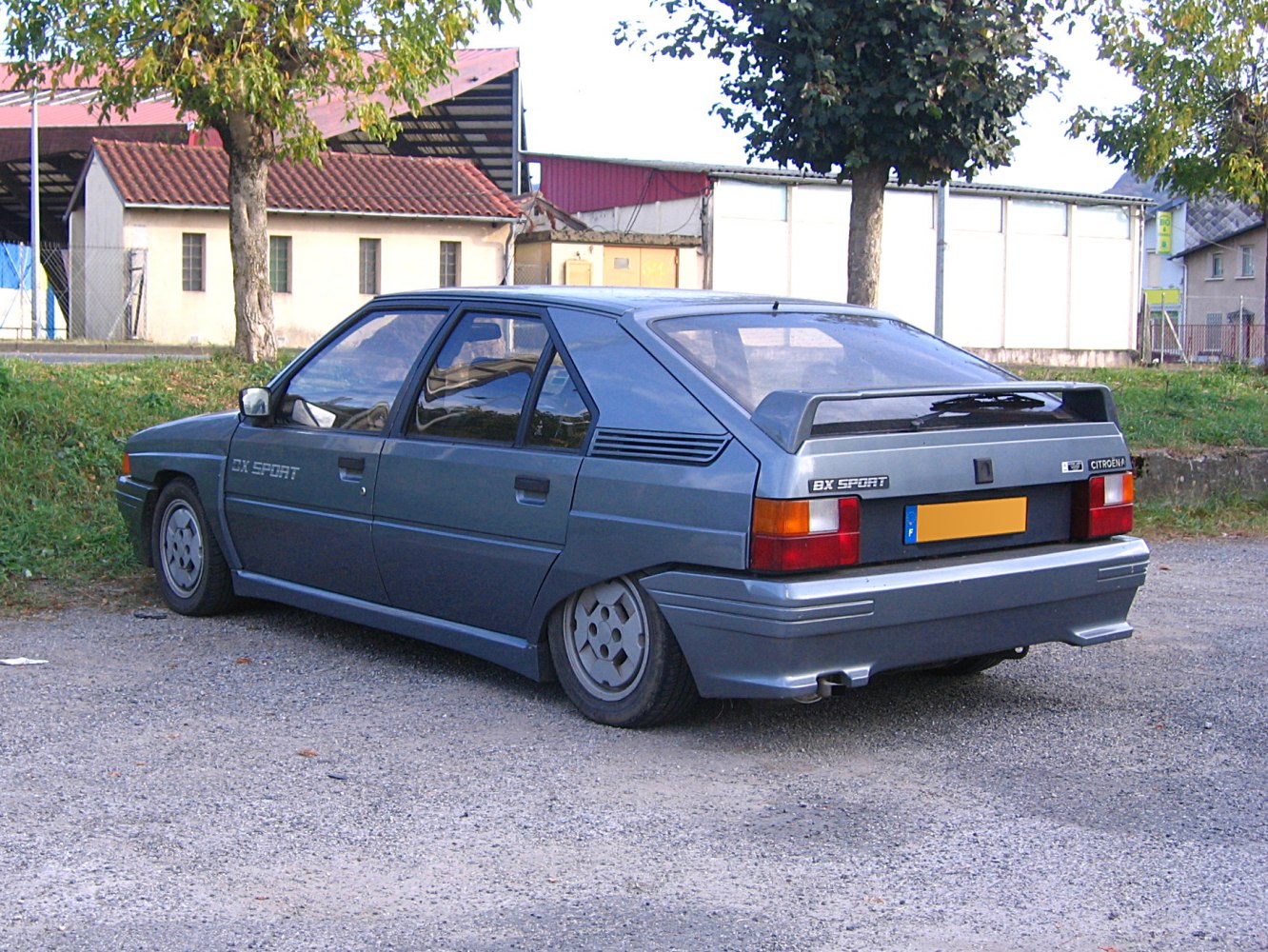 Rear side hatchback with distinctive aero spoiler and angular design