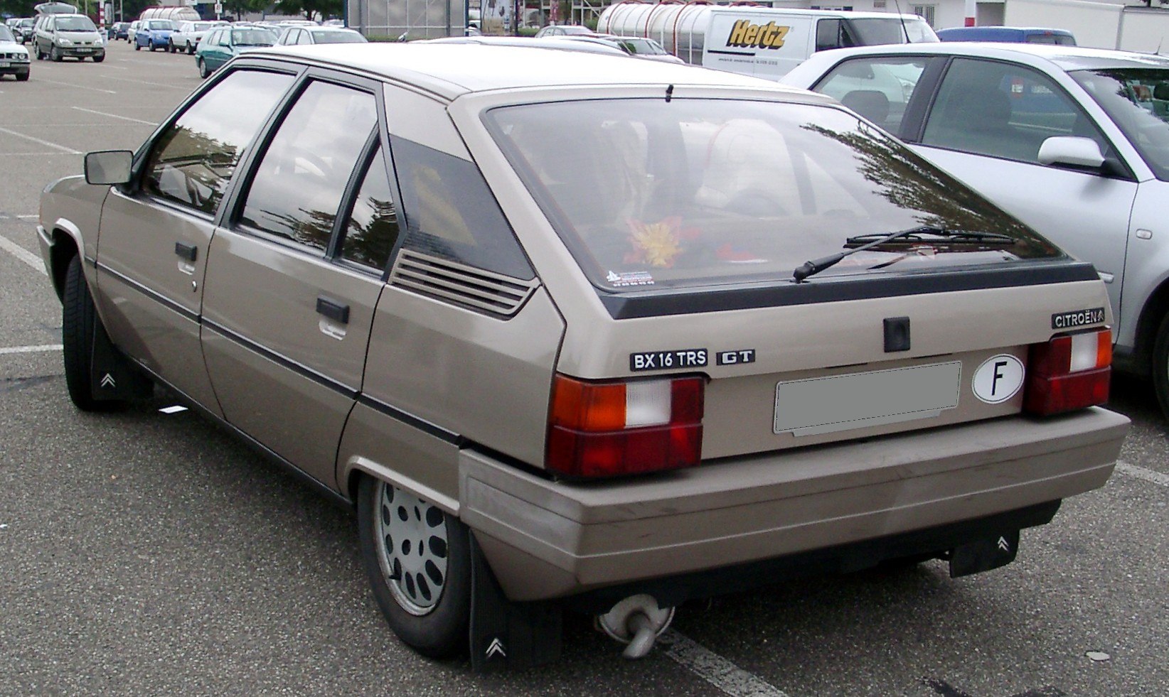 Rear three-quarter view of an angular hatchback with distinctive taillights
