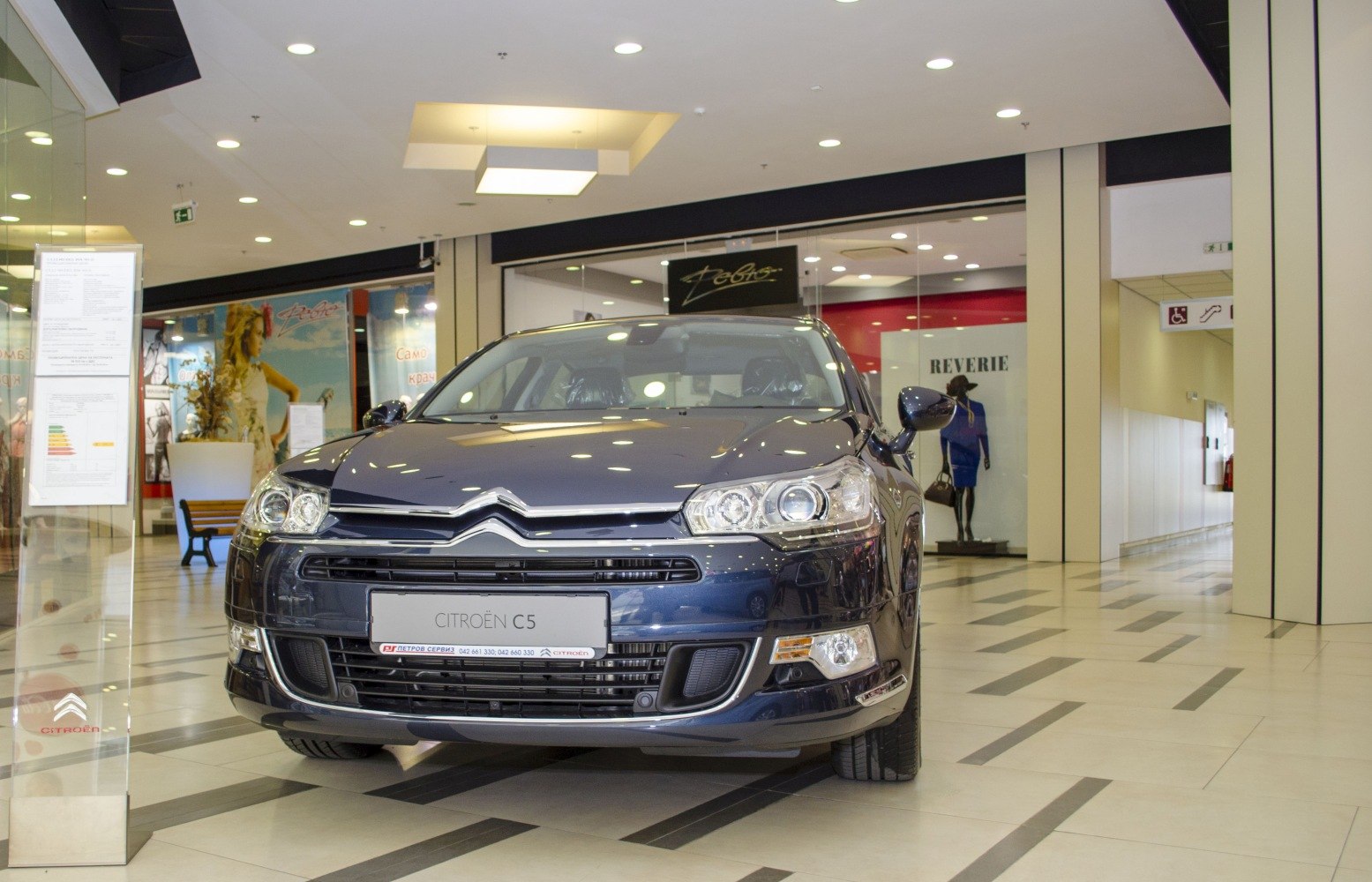 Front view with headlights and grille in showroom