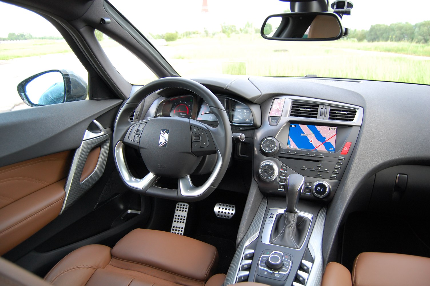 Luxurious interior with advanced dashboard and sporty steering wheel