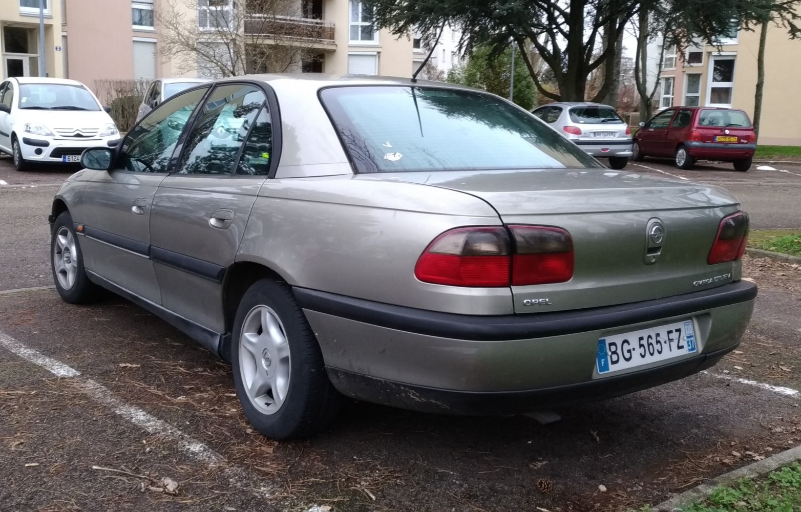 Rear-side view with distinct tail lights and alloy wheels