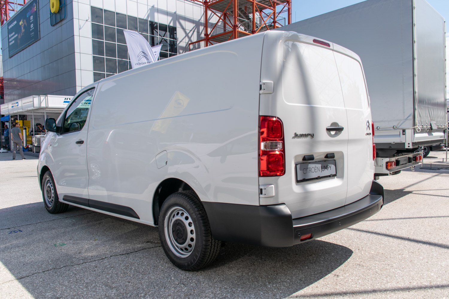 White panel van with rear double doors and steel wheels