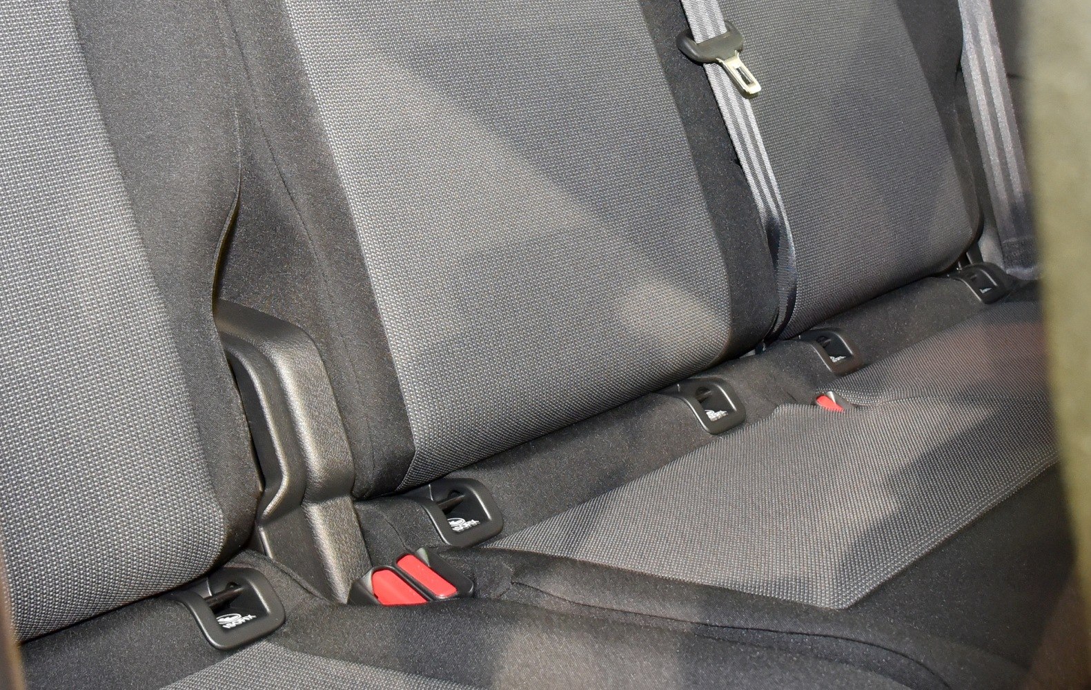Rear seat upholstery with seatbelt anchors and Isofix points