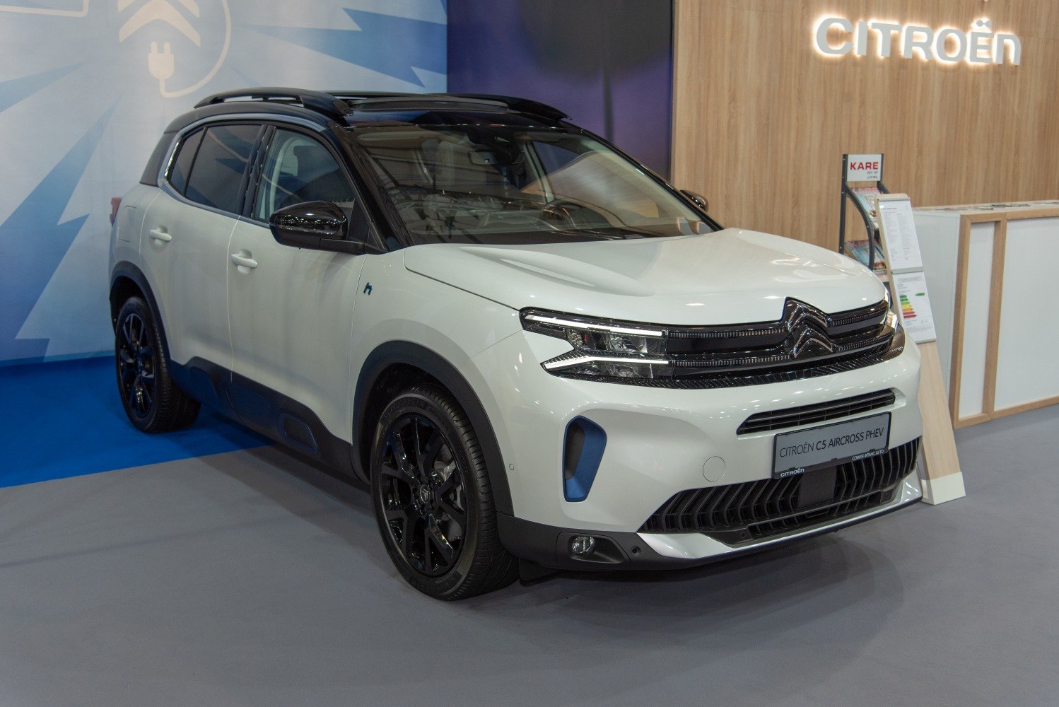 Facelift SUV with LED headlights, black wheels, and aggressive grille