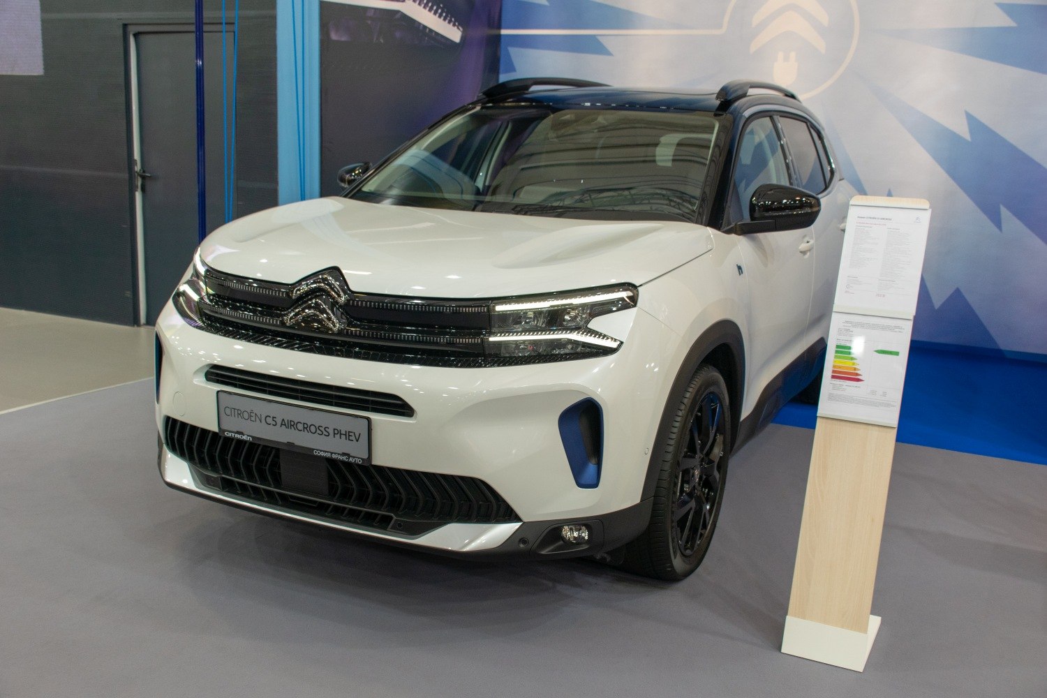 Front view with distinctive grille and sleek headlights of modern SUV