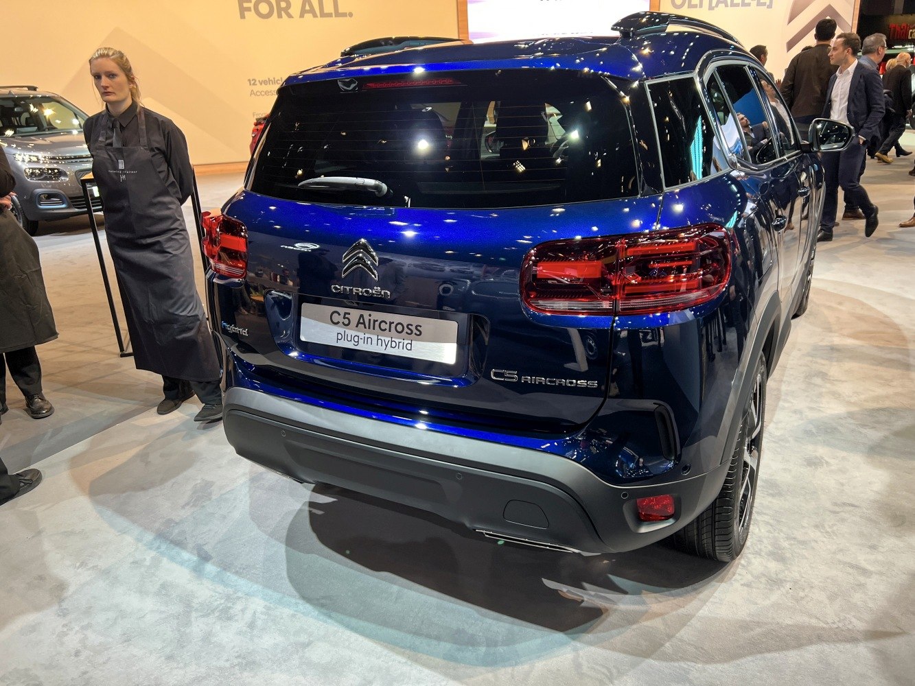 Rear view of modern SUV with distinct taillights and hybrid badge