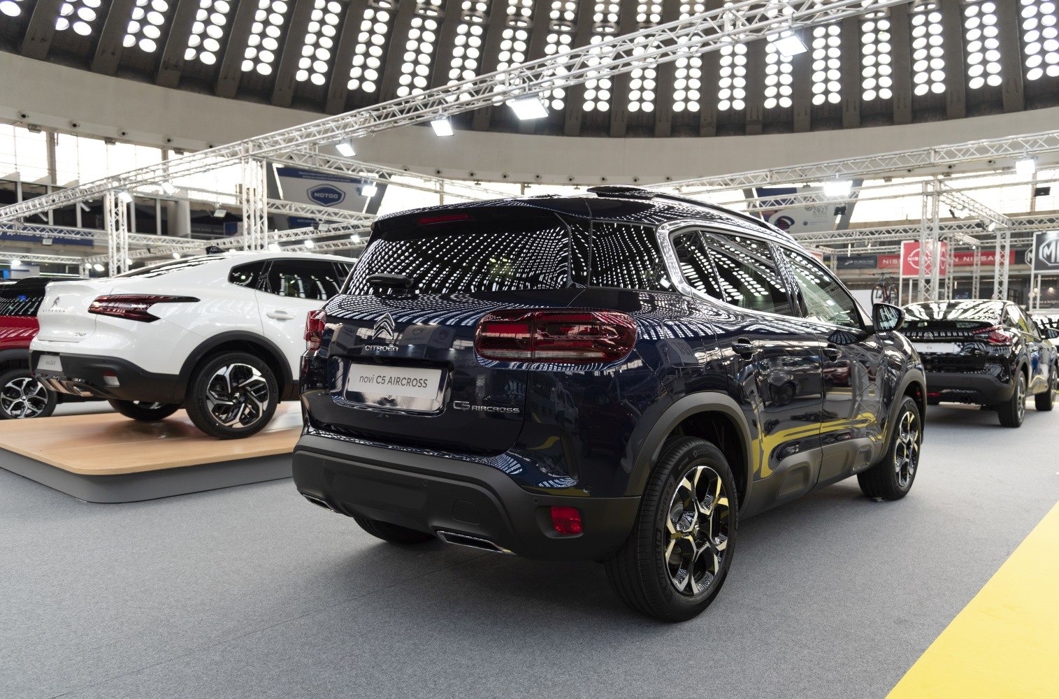 Rear and side view of a modern SUV with distinctive taillights and alloy wheels