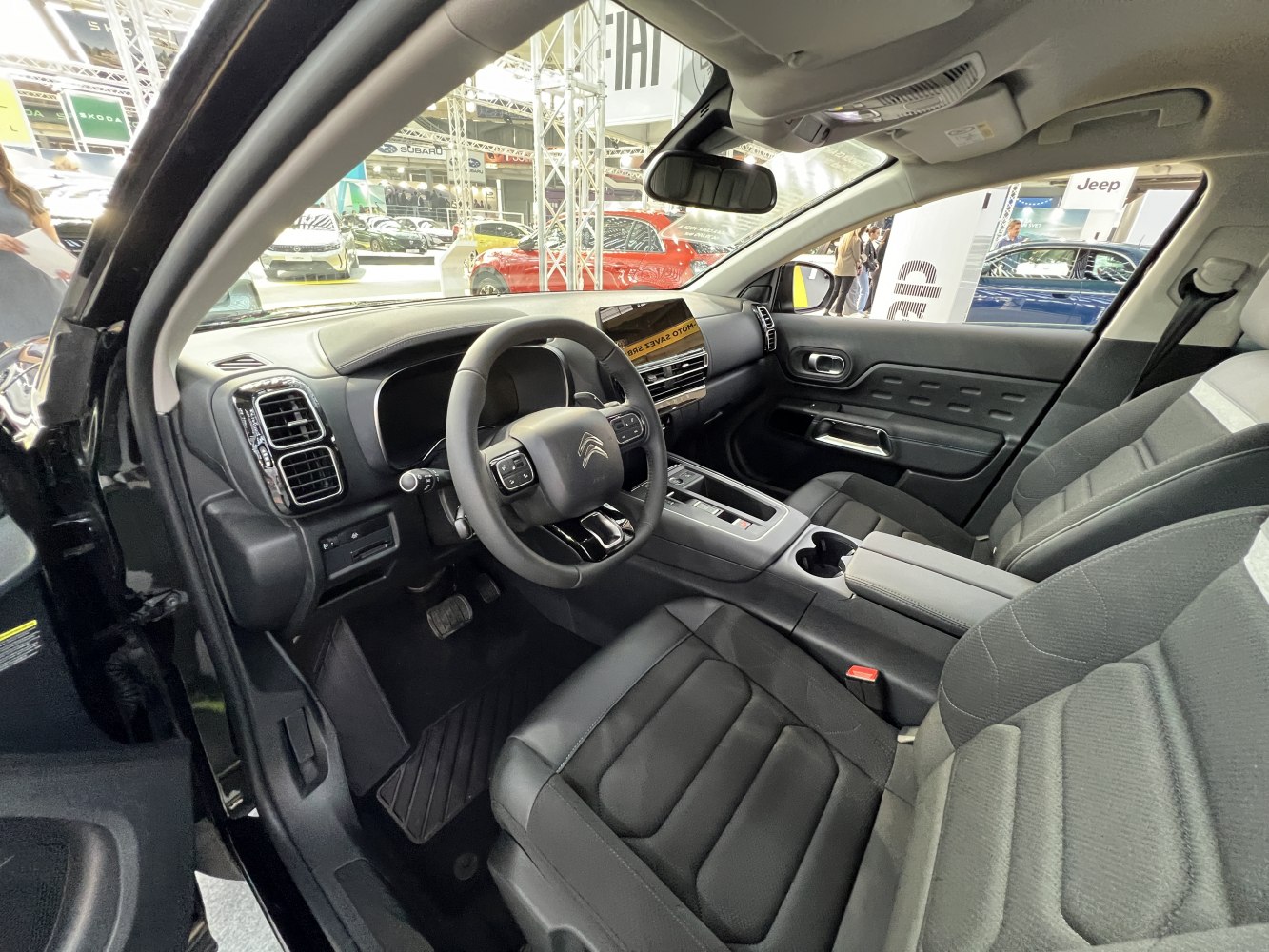 Modern dashboard with steering wheel and comfortable front seats