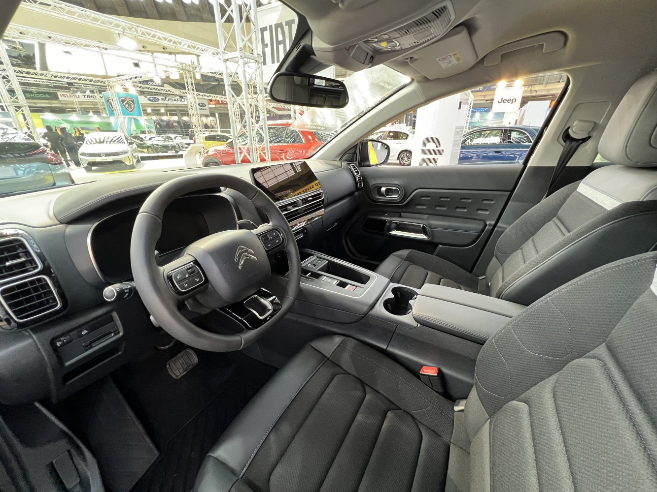 Modern interior with digital dashboard and ergonomic steering wheel