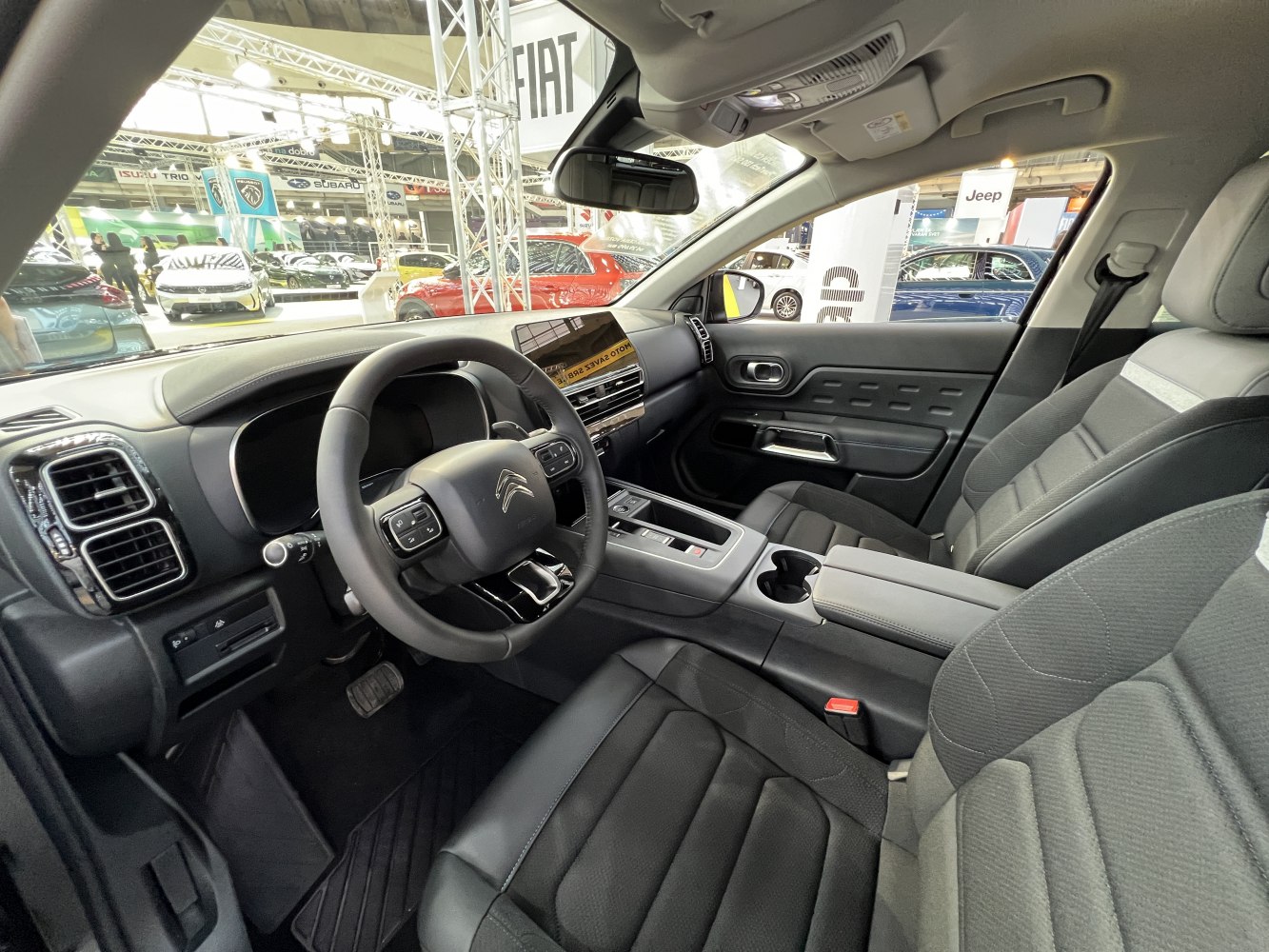Modern SUV interior with digital dashboard and ergonomic seats