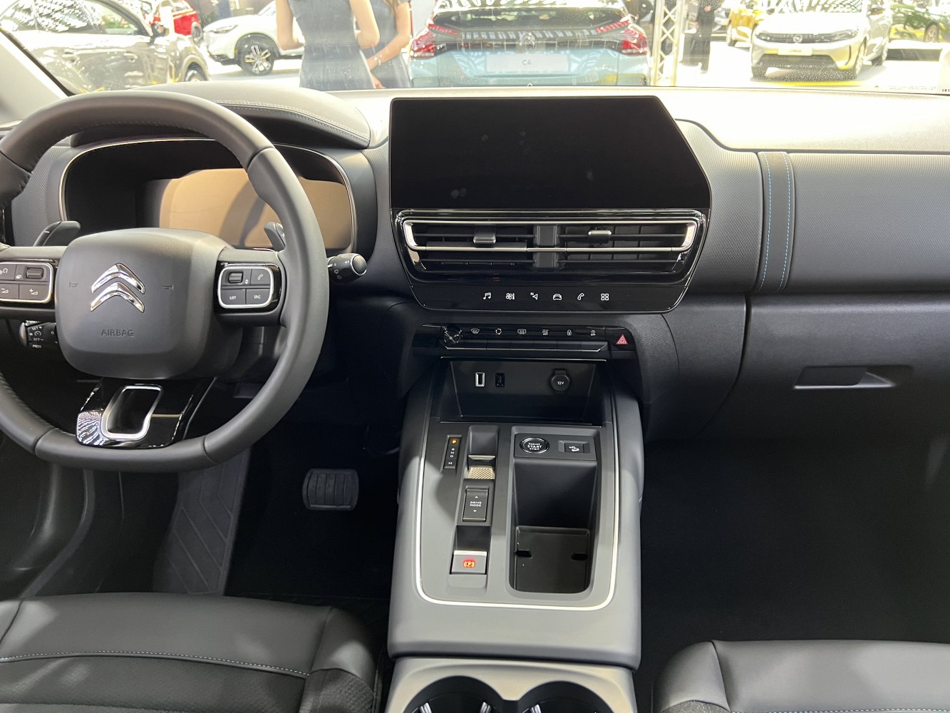 Digital dashboard and touchscreen with sleek center console and steering wheel controls