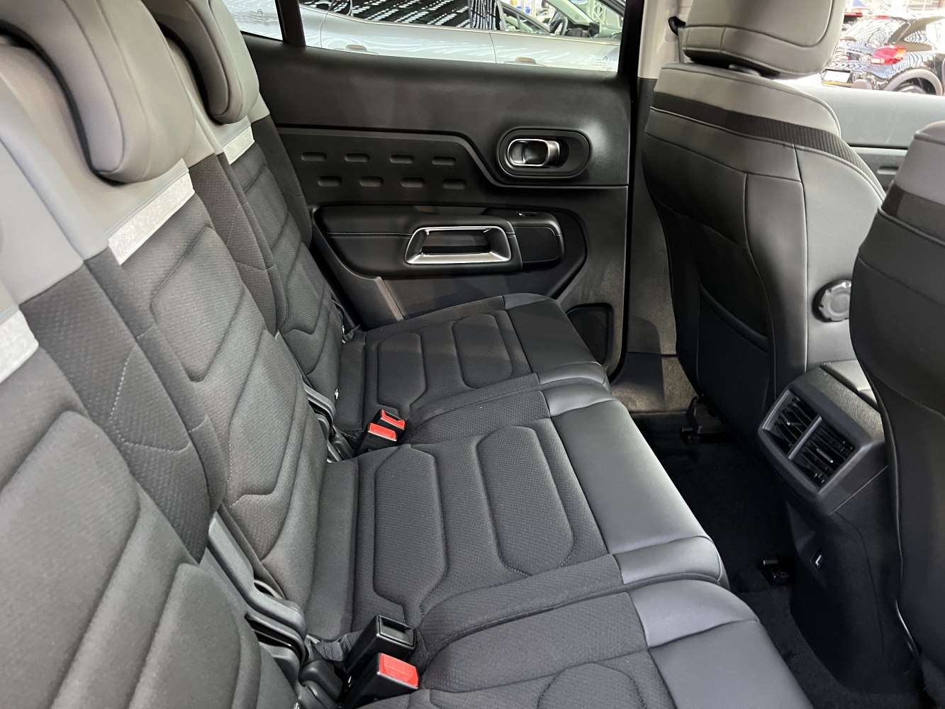 Spacious rear interior with comfortable seating and modern design elements