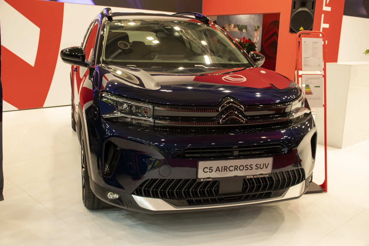 Front view with LED headlights and grille design of a modern SUV
