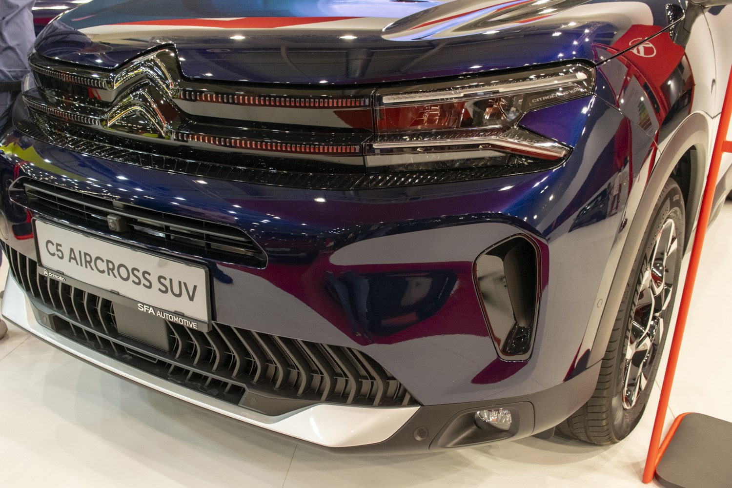 Front grille and LED headlights close-up of modern SUV