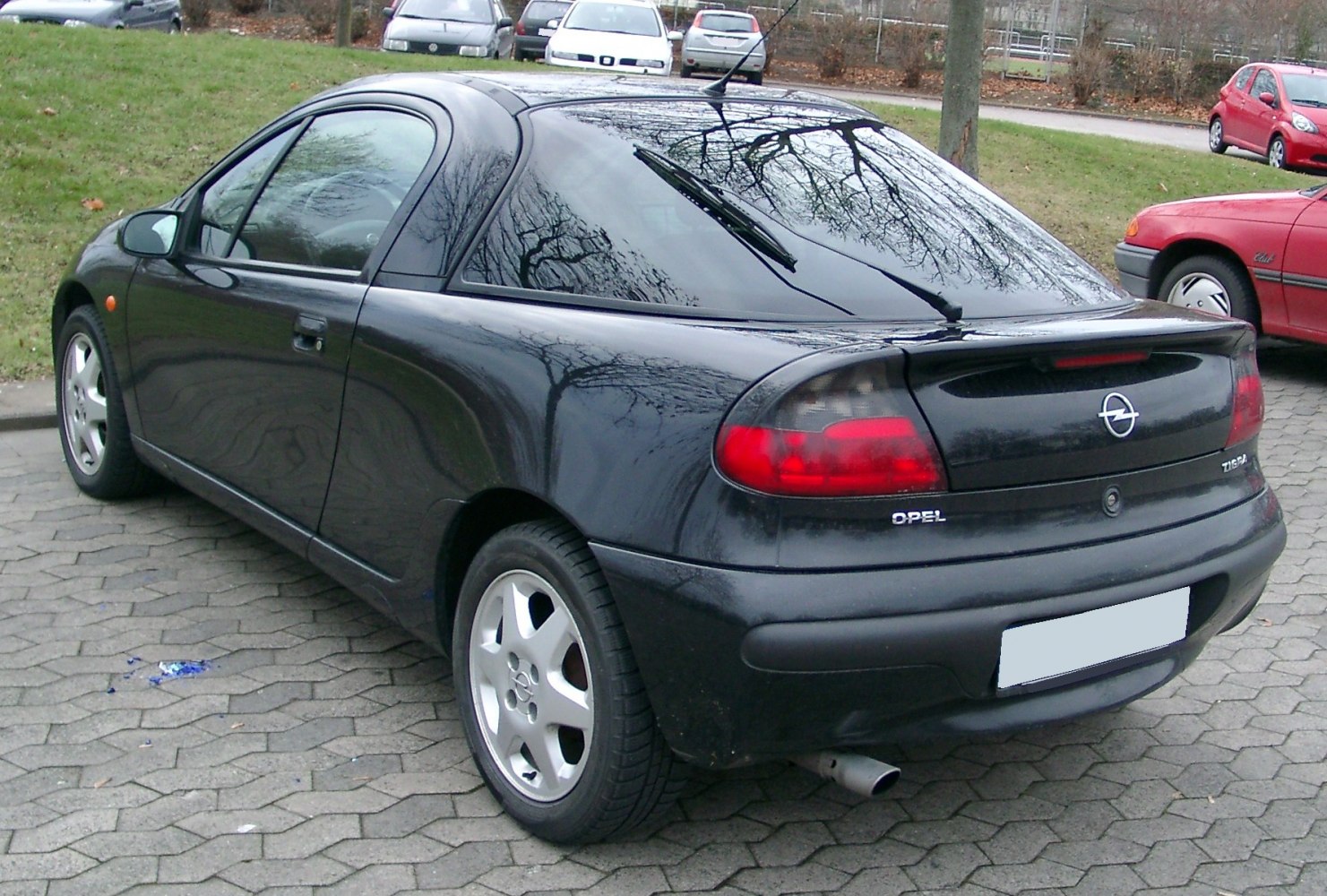 Compact hatchback rear with rear wiper and rounded tail lights
