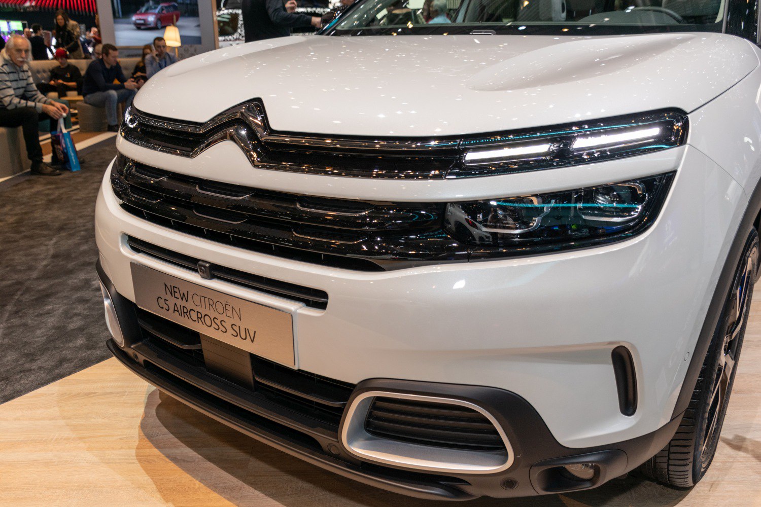 Close-up of SUV front grille and LED headlights