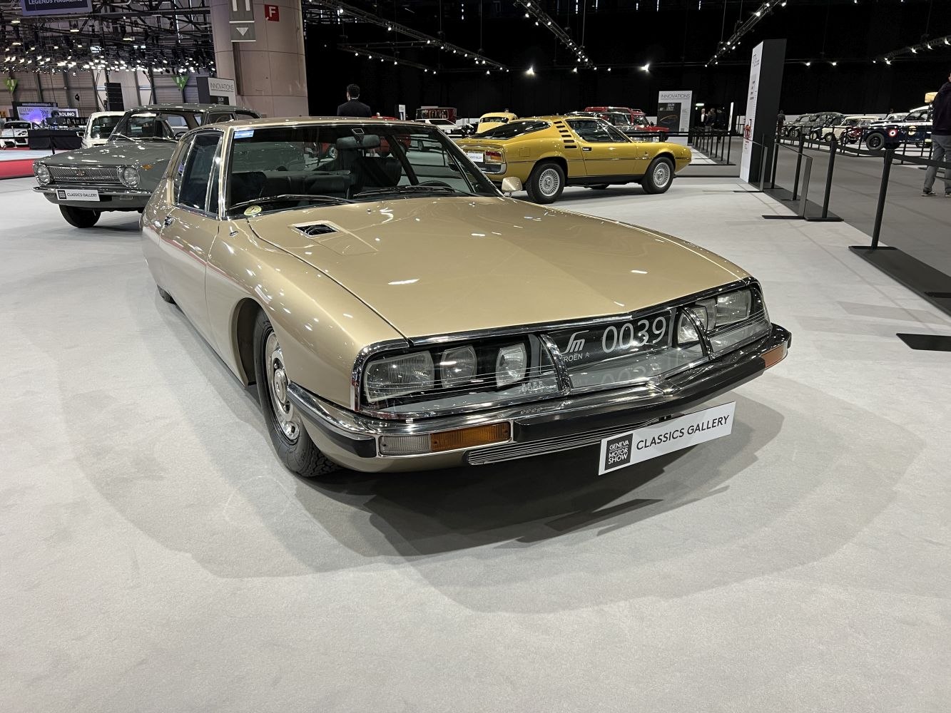 Low-slung coupe with dual rectangular headlights and sleek vintage design