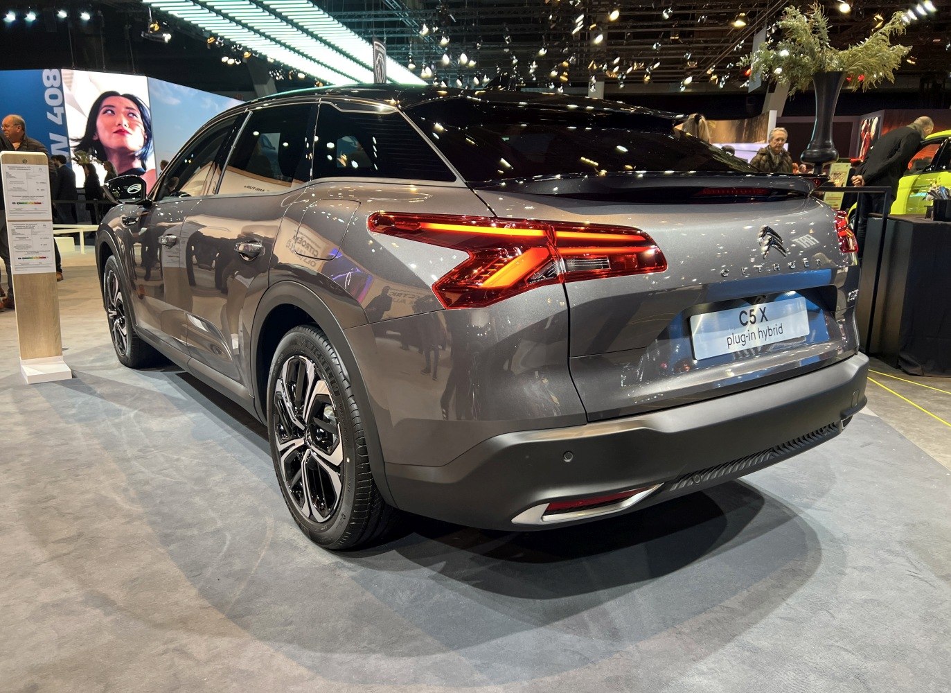 Rear view of modern hybrid SUV with distinct taillights and rear styling