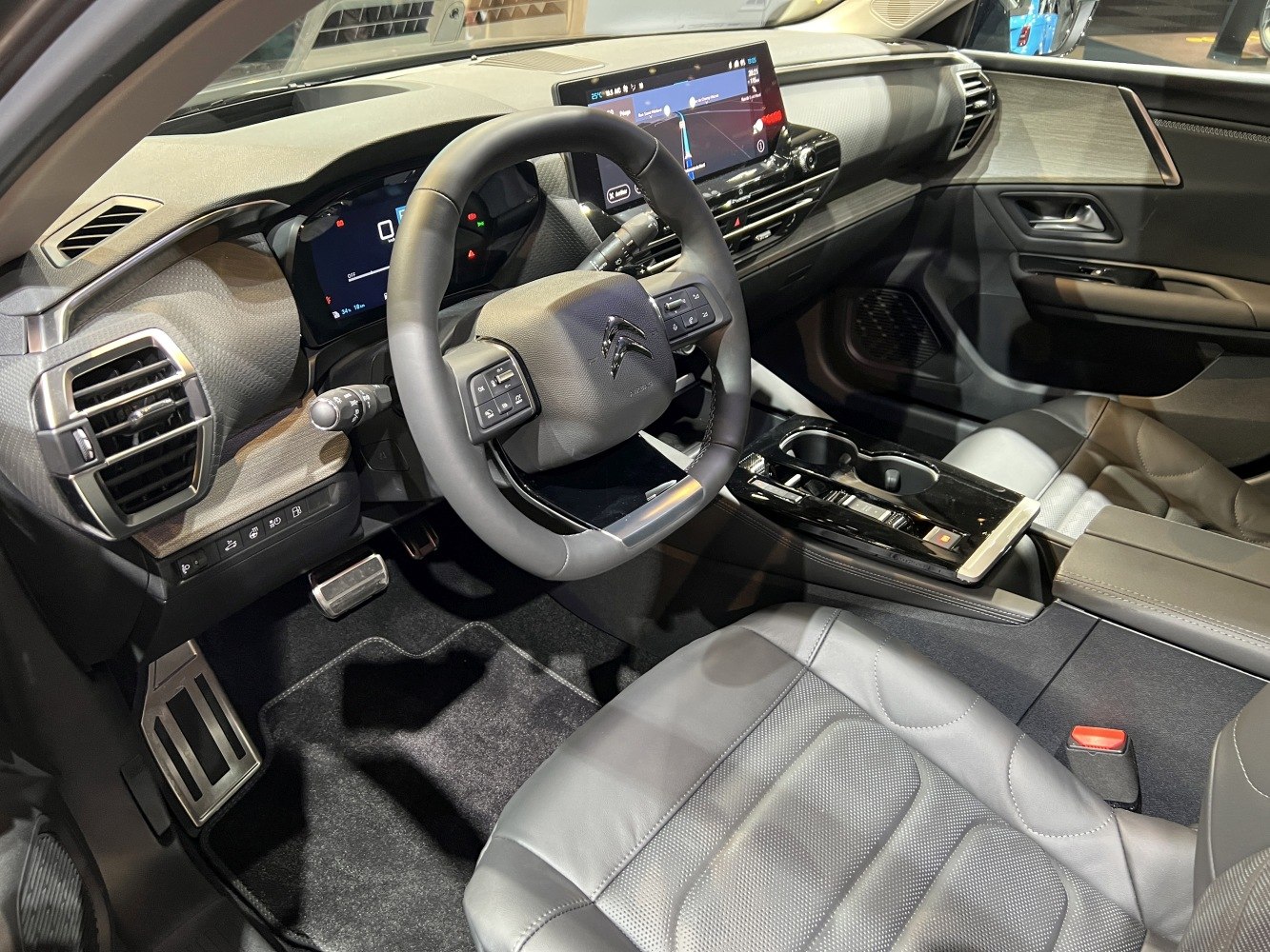 Modern digital dashboard and premium car interior with leather seats