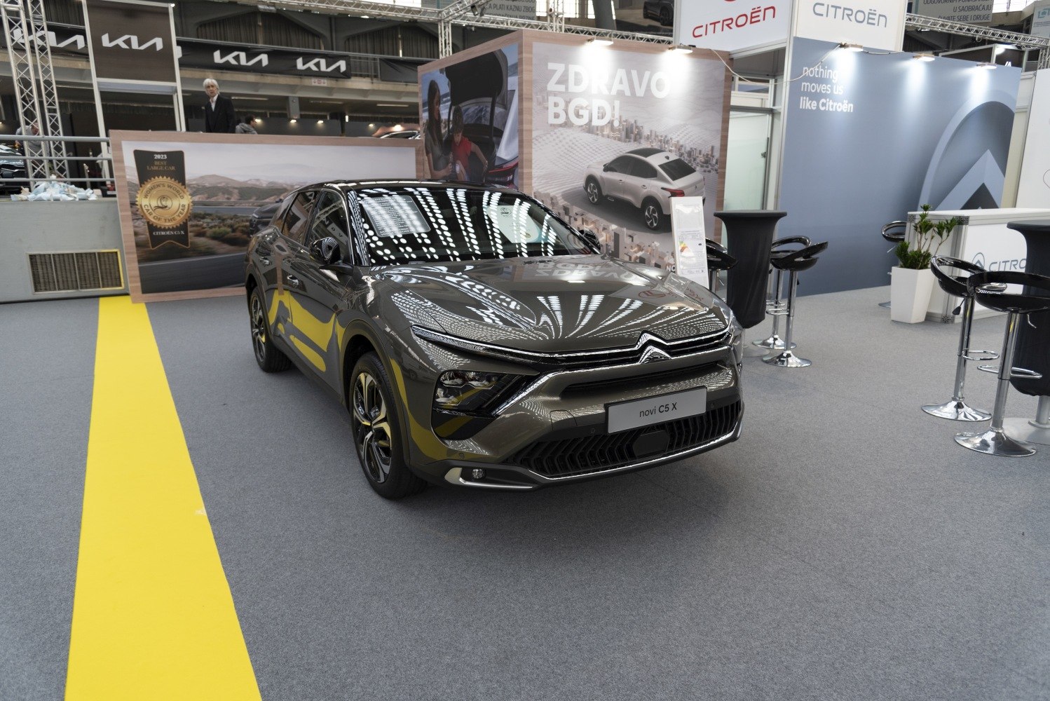 SUV front with distinct LED headlights and bold grille at exhibition