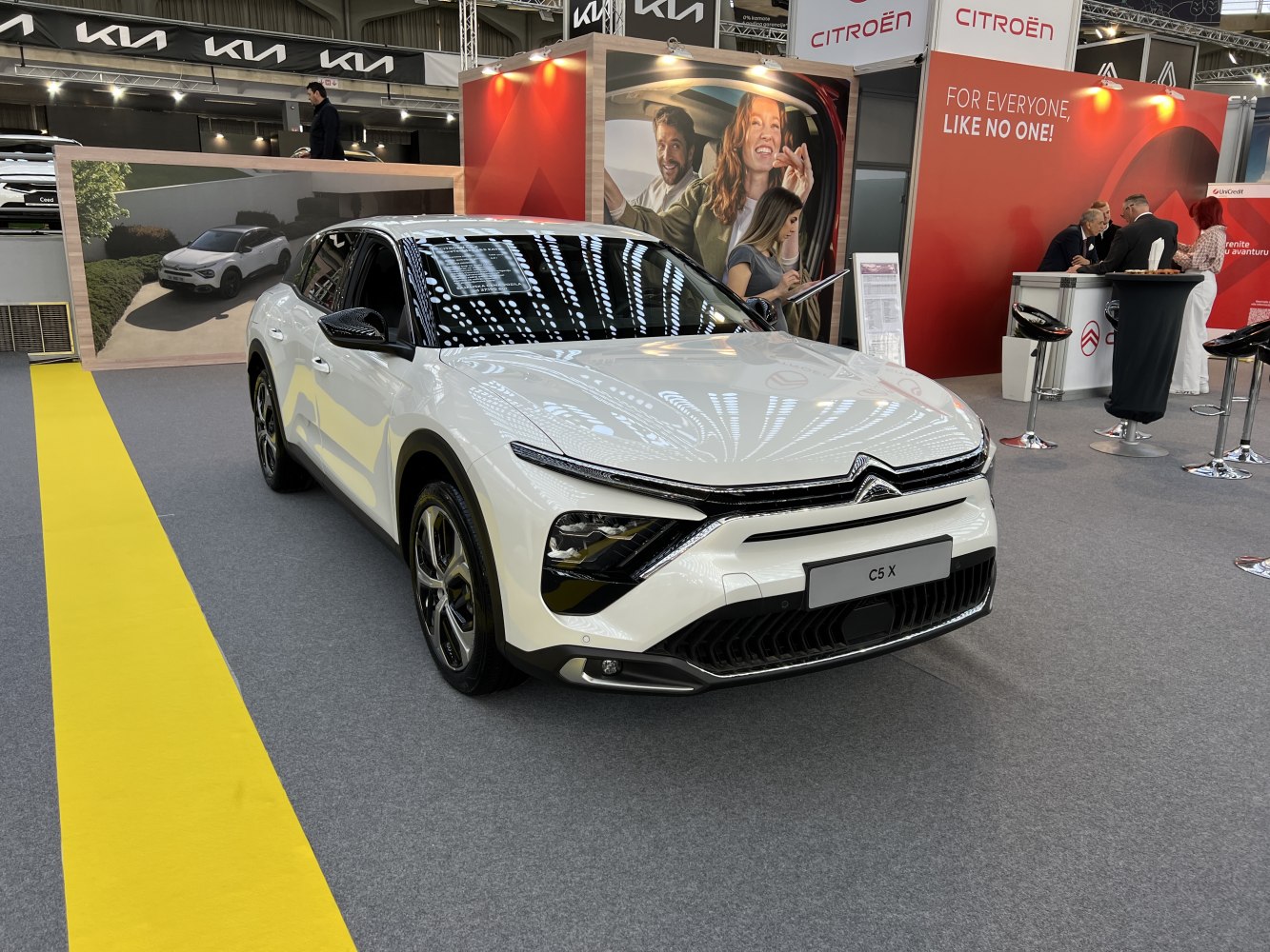 Front view with LED headlights and modern aerodynamic design.