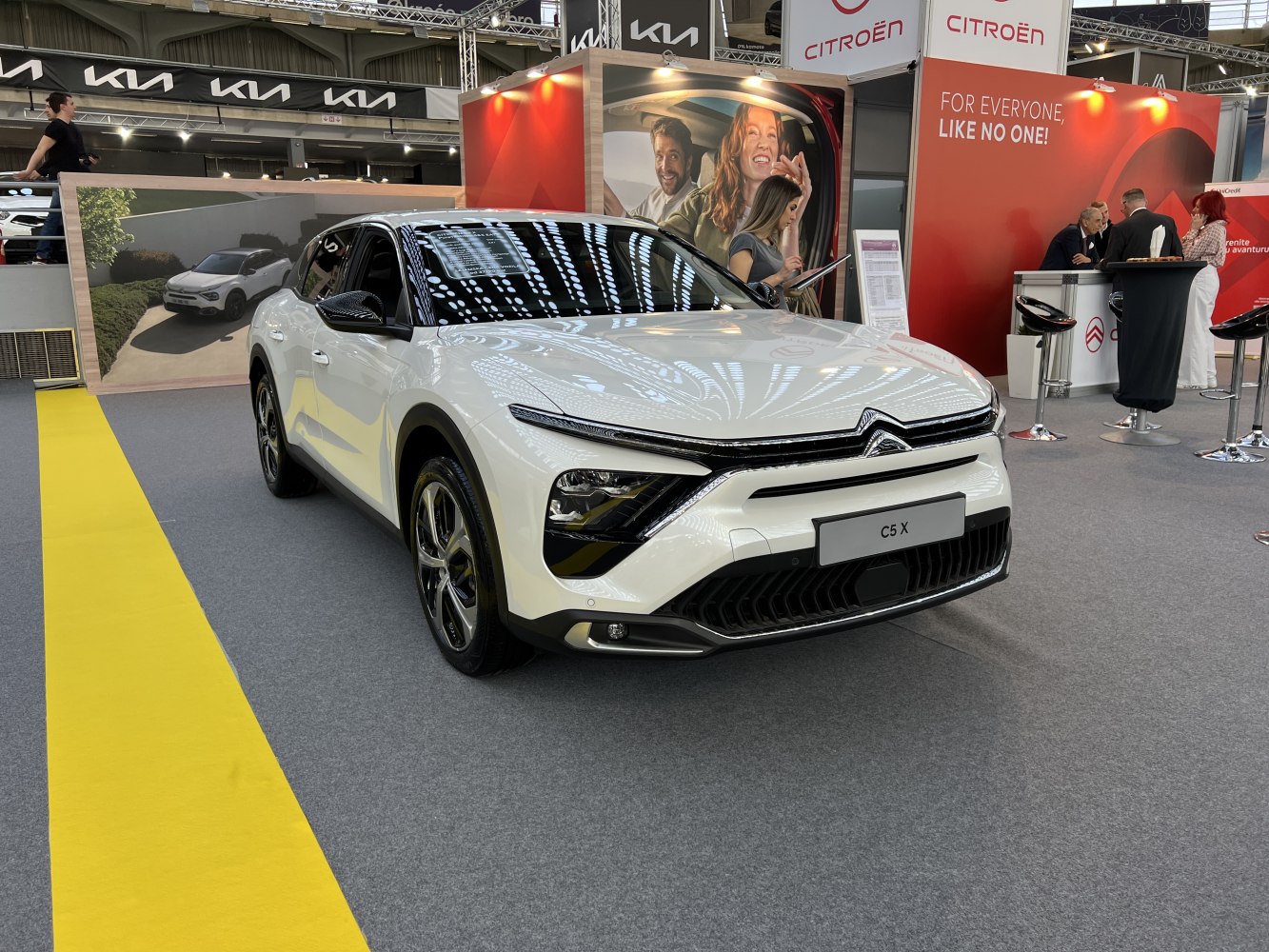 Front view of 2022 car with split LED headlights and modern grille
