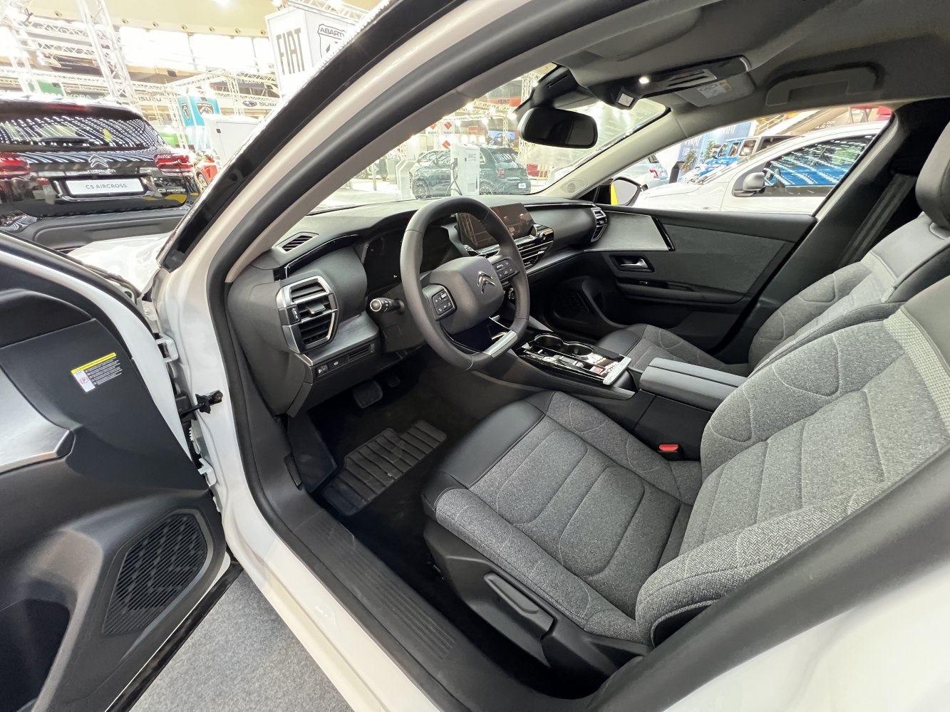Modern dashboard and comfortable textured fabric front seats