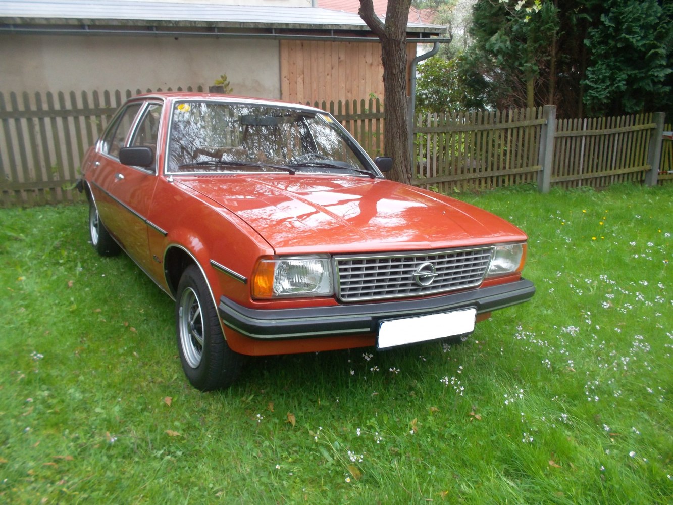 Front view with grille and rectangular headlights of classic car