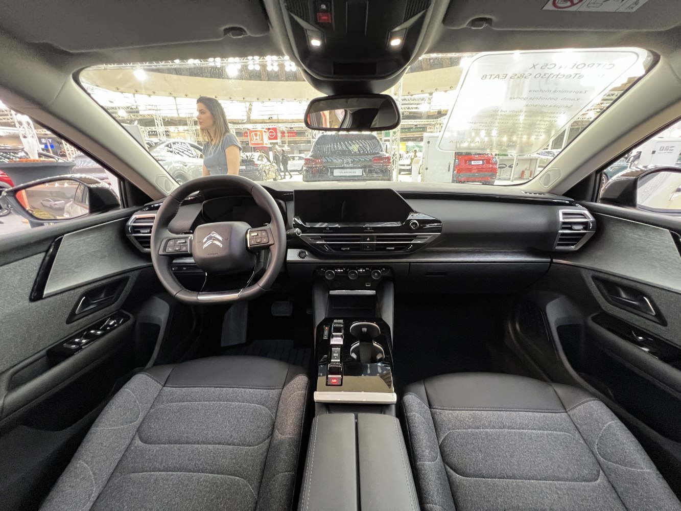 Modern dashboard, steering wheel, central console, and seating upholstery