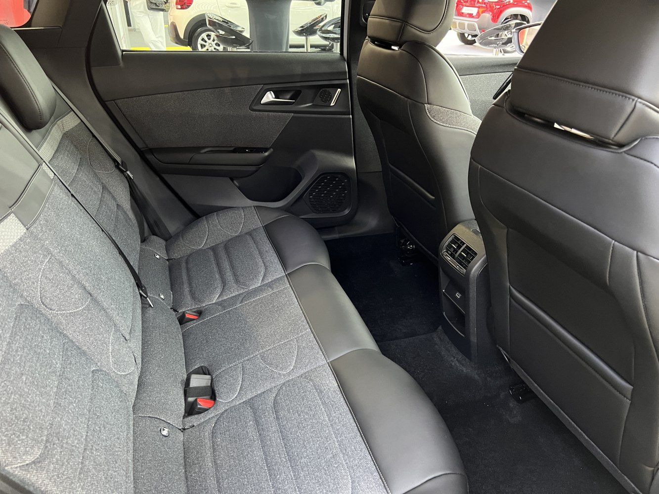 Spacious rear seats with fabric and leather upholstery plus rear air vents.
