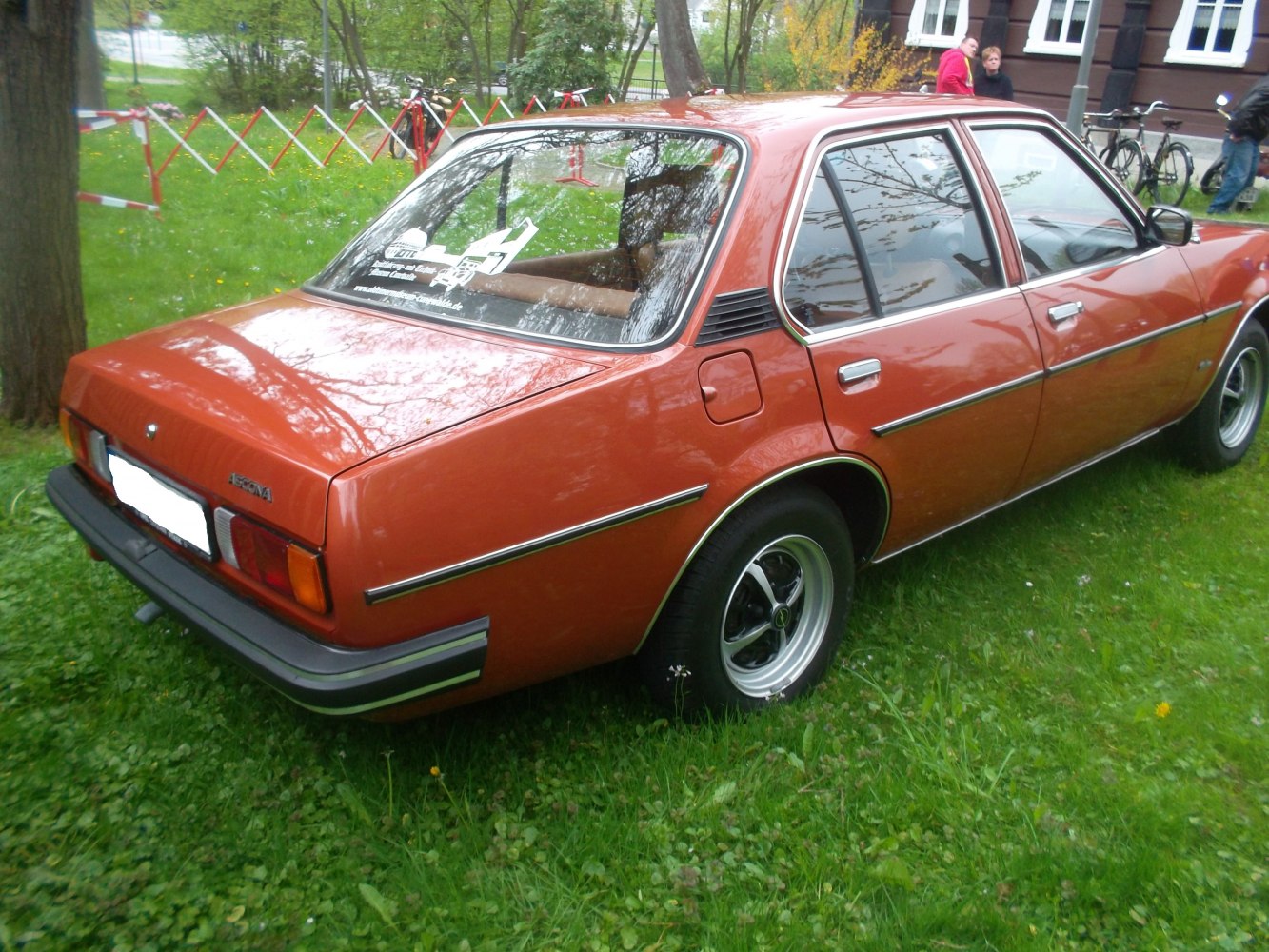 Rear and side view of a classic late 1970s sedan with angular design and chrome accents.