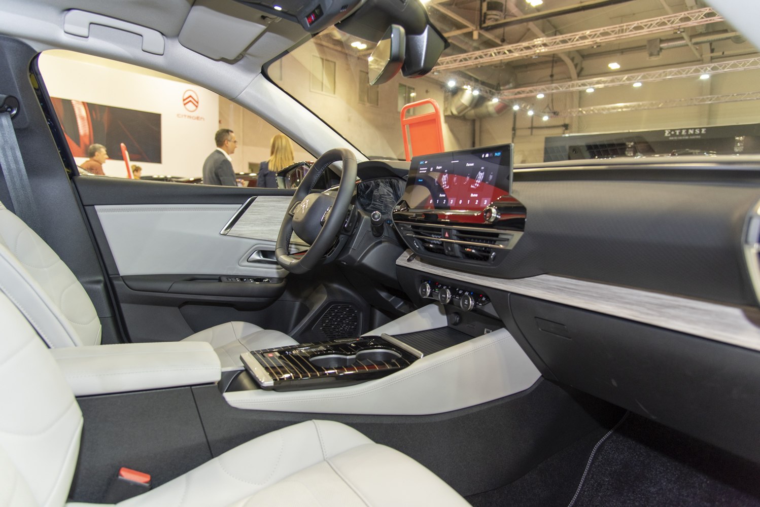 Modern car interior with digital dashboard and premium seats