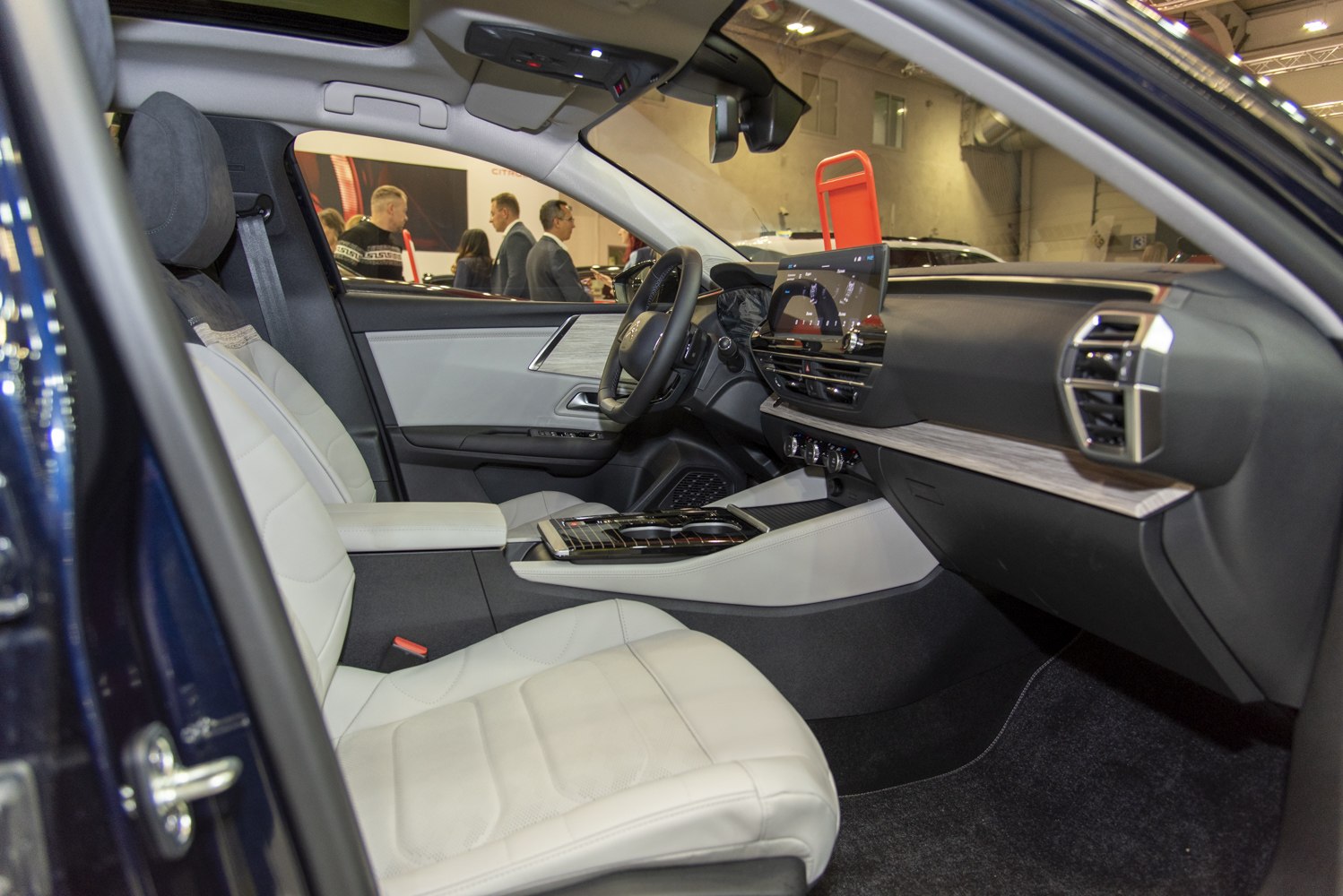 Modern car interior with premium front seats and digital dashboard