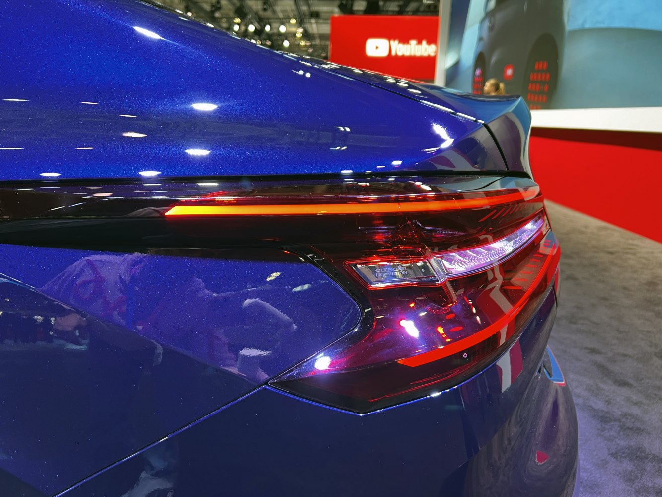 Close-up of rear LED taillight and sleek rear contours